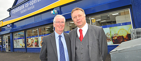 JW Filshill’s Ian McDonald and Robert Sider of Clydebank Co-op outside the new store.
