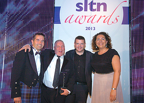 • Stuart Clarkson (above second from left) picks up the SLTN Award for Industry Achievement, in association with Maxxium UK, from Maxxium’s Huw Pennell, Kevin Bridges and SLTN editor Gillian McKenzie before the party gets underway.