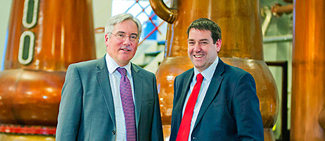 • Ian Macleod Distillers’ Mike Younger (right) with Laurence Jamieson.