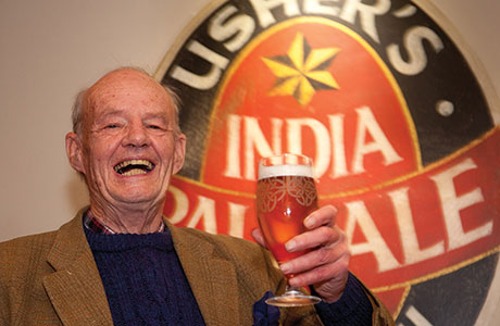 • Cheers: Stuart Usher toasts the first pint.