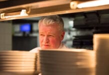 A chef at work in a commercial kitchen