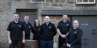 The-team-at-Speyburn pose outside the distillery