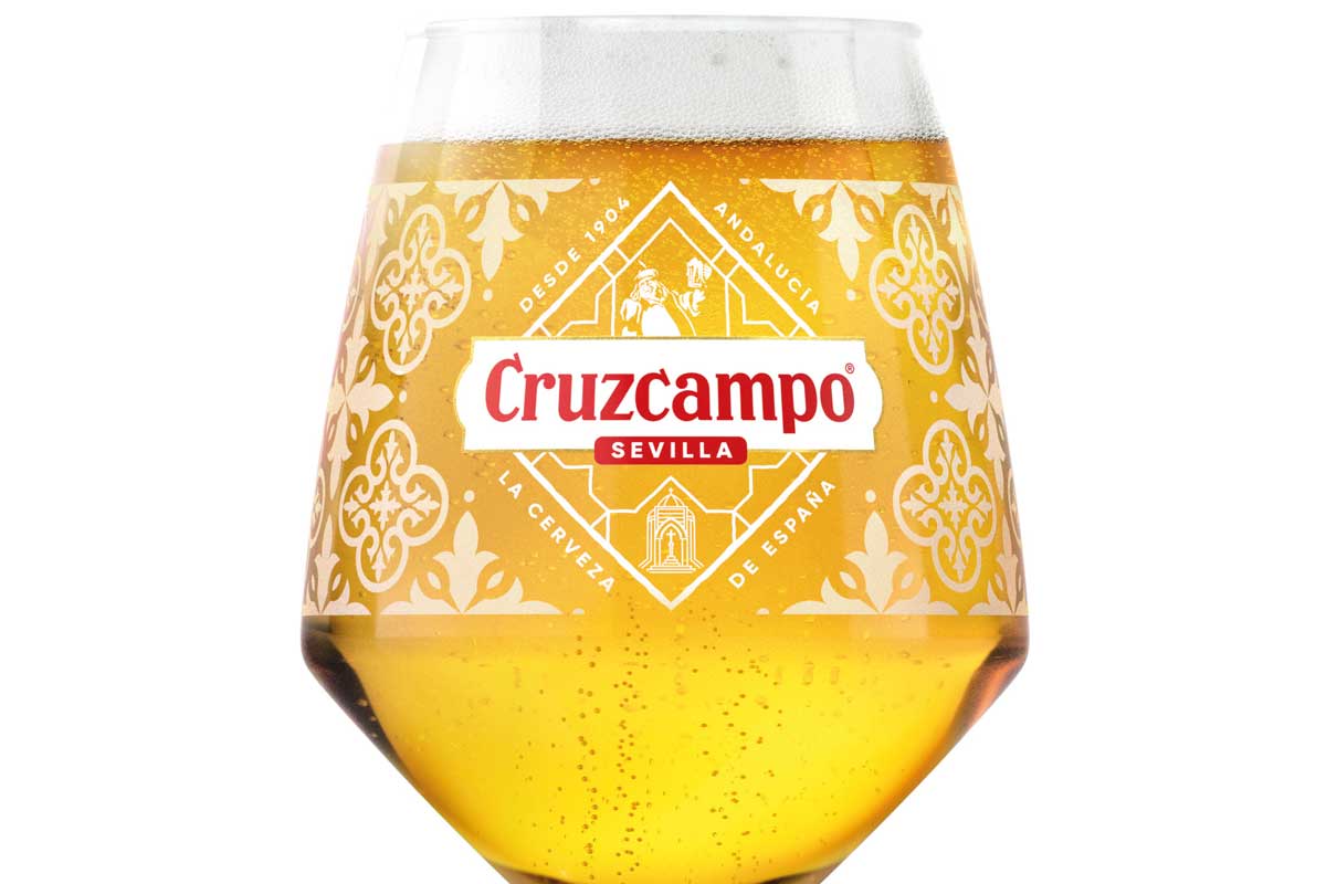 Pint glass of Cruzcampo Beer