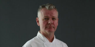 a middle aged man in chef's whites