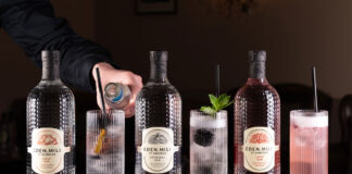 three bottles of eden mill gin with and tall glasses with gin serves