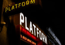 Neon signage outside a venue