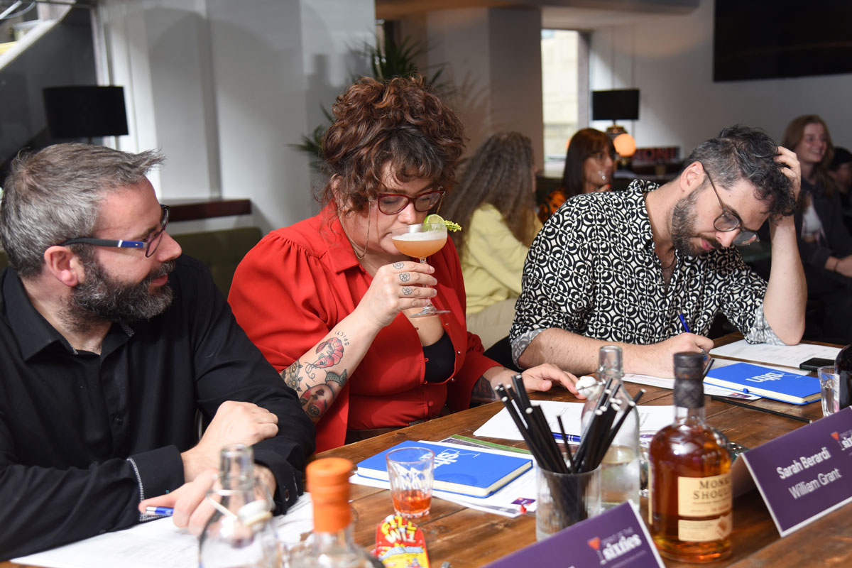 Cocktail competition judges deliberate