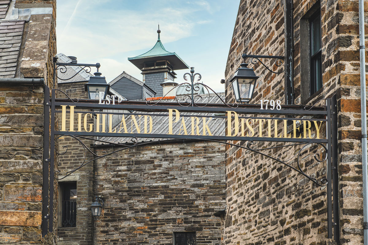 Metal gates and sign above the entrance to the Highland Park whisky distillery