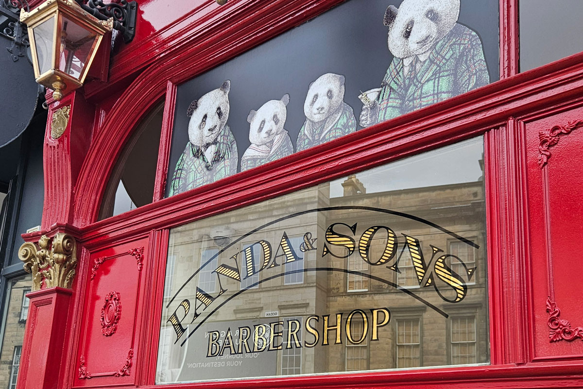 A red shopfront with cartoon animals