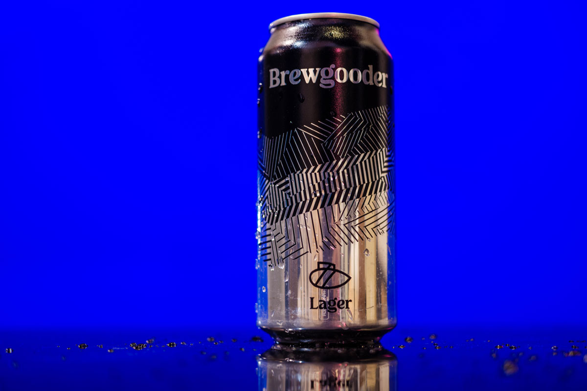 A silver and black can of lager