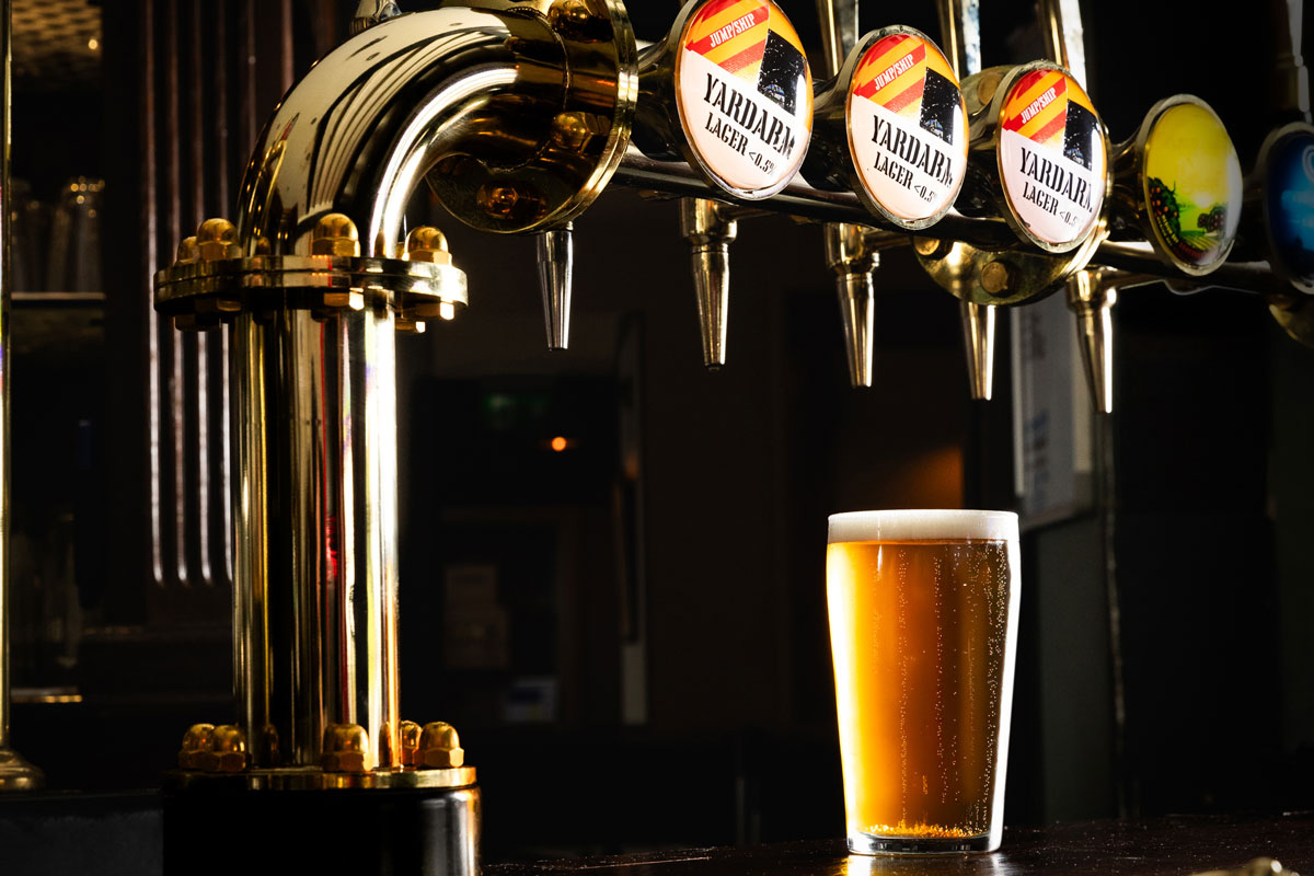 A pint of non-alcoholic beer Yard Arm under Jump Ship's new keg taps