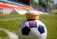 A pie on top of a football