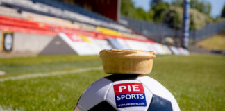 A pie on top of a football