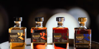 A line up of four whisky bottles