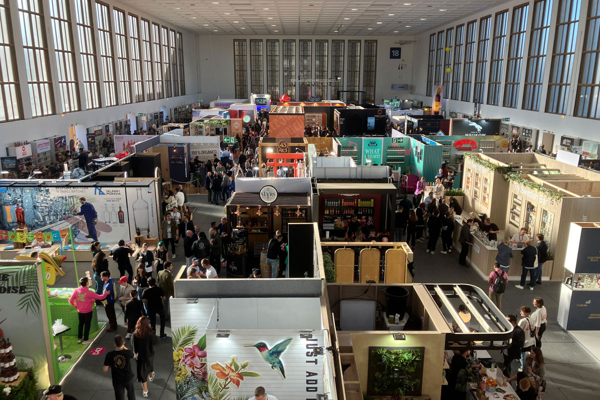 A cathedral like hall hosts a trade exhibition