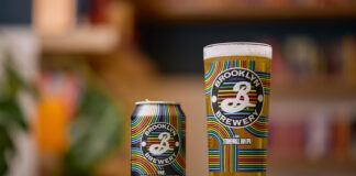 A pint of pale beer and a can, both in rainbow branding