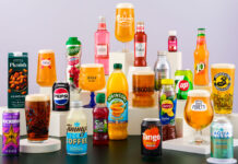 a colourful collection of bottles and cans containing both soft drinks and beer