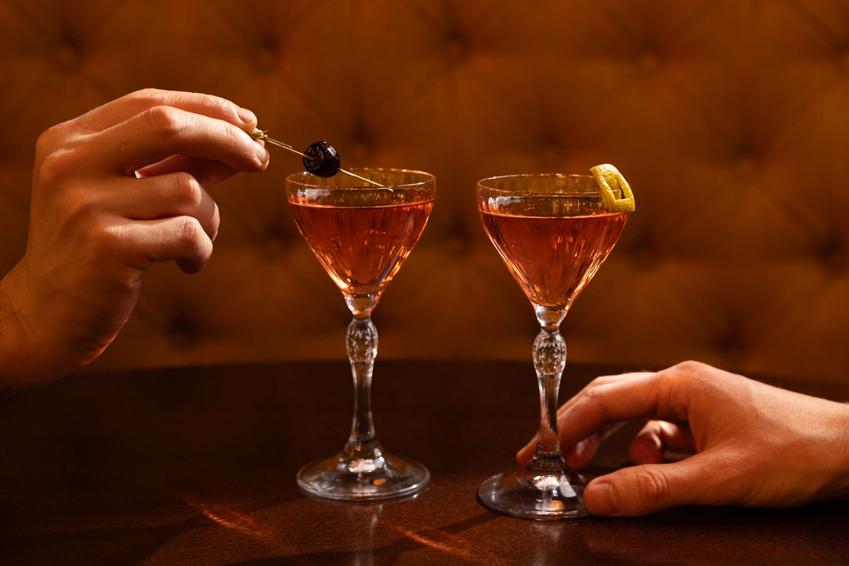 Two martini-style glasses filled with pink liquid