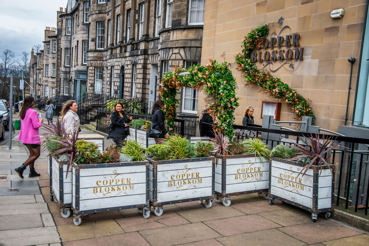 A line of young ladies enters an Edinburgh bar