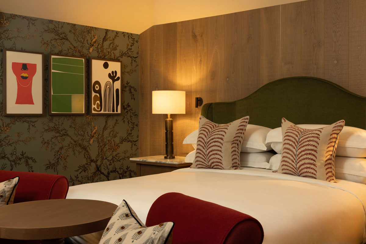 A plush hotel room with modern decor