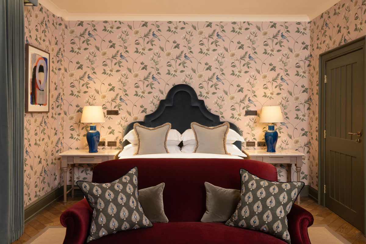 A plush traditionally decorated hotel room