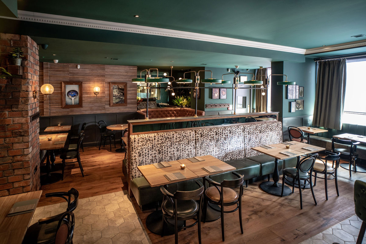 the interior of a well decorated restaurant