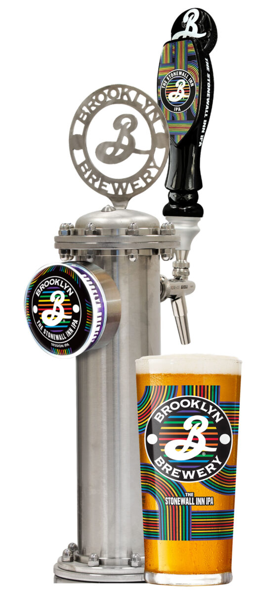 a beer tap and a pint of beer