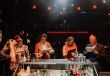 Diageo wants to know – have you got what it takes to be World Class? Four brightly dressed people sit at one side of table judging a competition