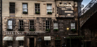 An Italian restaurant housed in an Edinburgh Old Town building under a bridge