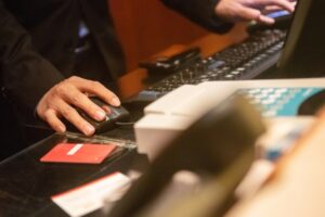 Close up of person typing on computer.