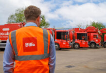 Biffa approved to sue Scottish Government for lost investment and earnings A man in a high-visibility tabard stands in front of a line of lorries