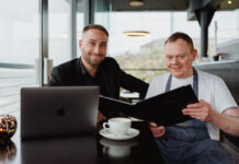 St Andrews’ seafood institution celebrates 20th anniversary with ‘Icons’ menu A well dressed man and a chef sit in a seafront restaurant