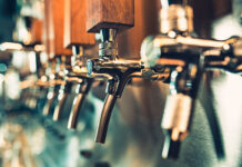 A line of clean beer nozzles