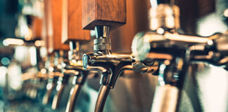 A line of clean beer nozzles