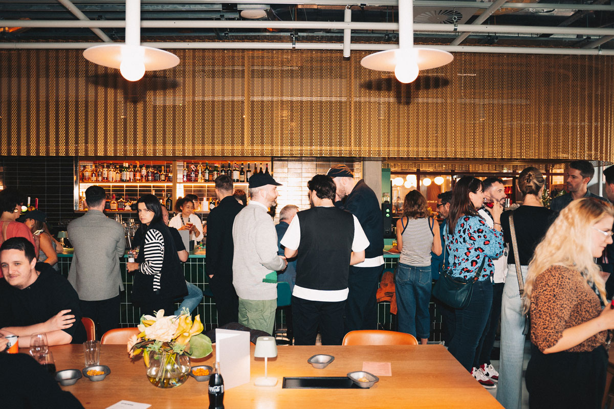 A bar area packed with people