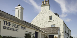 A traditional whitewashed Scottish countryside inn