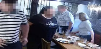 CCTV images of four people leaving a pub table