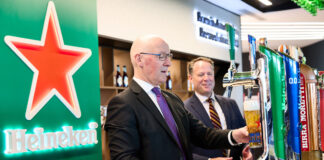 First Minister Jon Swinney pours a pint