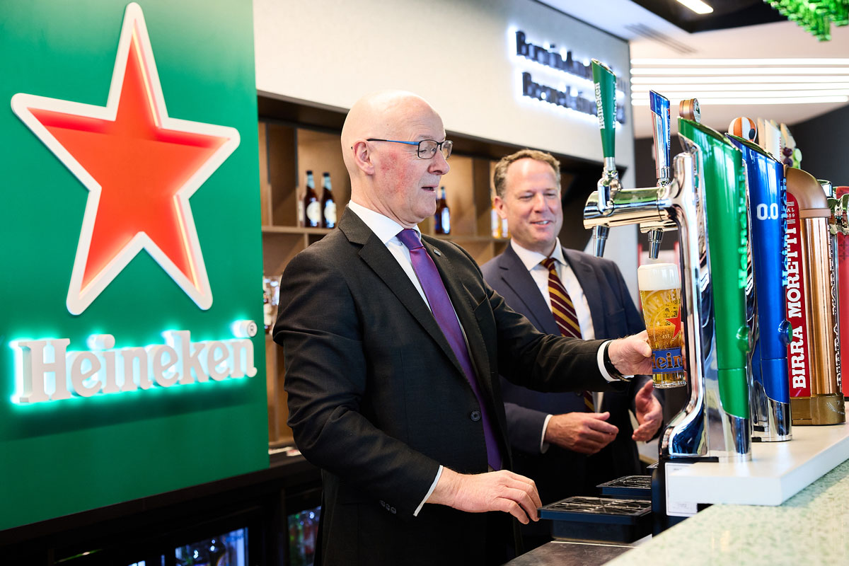 First Minister Jon Swinney pours a pint