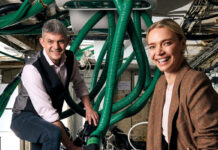 Majority of UK people love a pub – but only a minority know how to run one A man and a woman in a pub cellar with the green pipes of a modern beer dispense