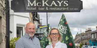 Jennifer Macdonald-Nethercott with Turas Hotels director Richard Drummon