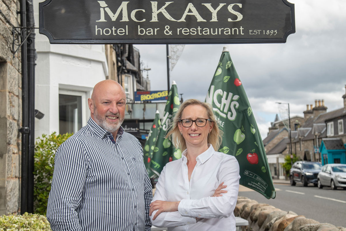 Jennifer Macdonald-Nethercott with Turas Hotels director Richard Drummon