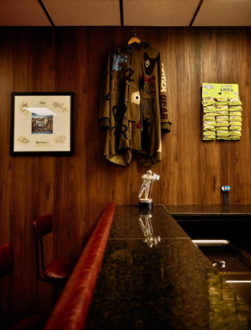 Liam Gallagher's coat hanging in Leith Social Club.