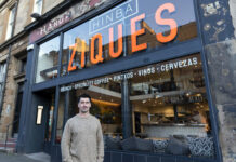 Fergus McCoss stands outside Ziques in Glasgow.