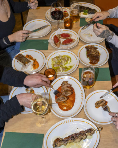 People eating dishes at Ziques in Glasgow.