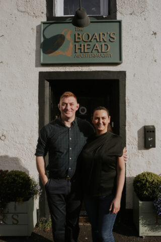 David Nolan and Justina Jonikaite stand outside The Boar's Head.