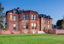 Buzzworks takes to the isles with Arran acquisition The front of the Douglas Hotel in Arran, in the evening light.