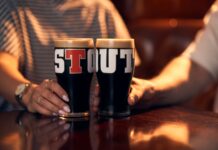 Wellpark enters the stout game with the launch of Tennent’s Stout Two pints of Tennent's Stout on a bar.